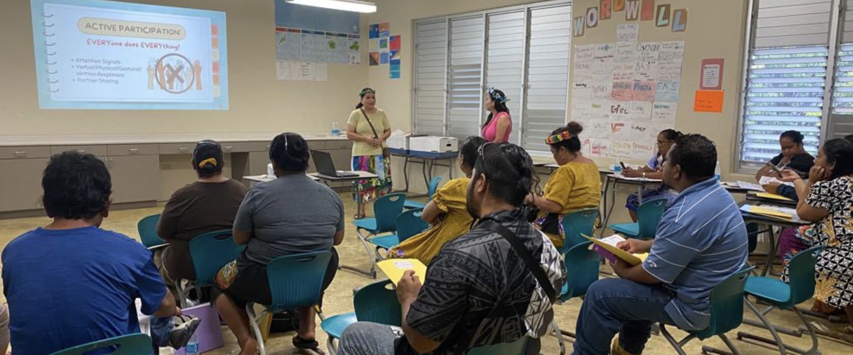 Guam CEDDERS Training Associate Rachel Duenas and Associate Director Josephine Cruz, EdD, (standing) present on the elements of explicit instruction during one of the conference sessions at Lelu Elementary School in Kosrae, FSM.